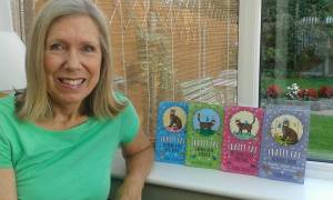 Lynne with four chatty cat books